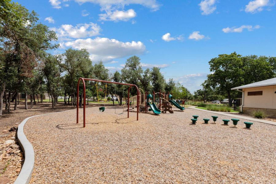 Lively Ranch community playground provides endless outdoor fun amidst natural surroundings. Lively Ranch community playground provides endless outdoor fun amidst natural surroundings.