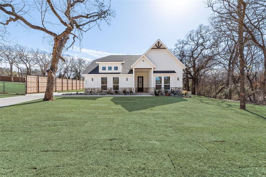 Front exterior of a new home in , Azle, TX, highlighting curb appeal (Image 23). Front exterior of a new home in , Azle, TX, highlighting curb appeal (Image 23).