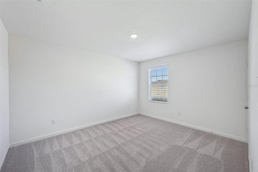 Spacious, unfurnished interior of a new home in Pelham Square, Deland (Image 24).