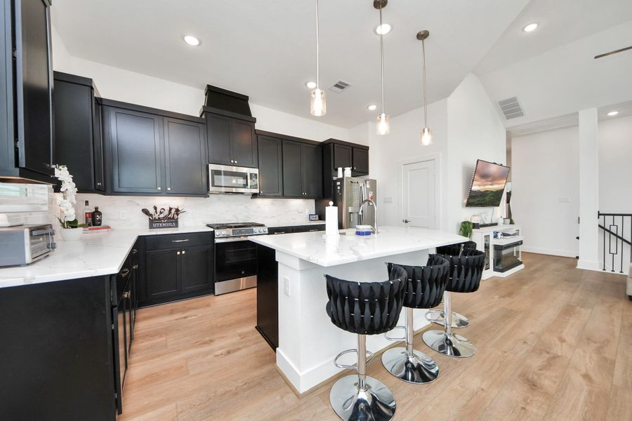 Furnished interior view inside a new home in Meridiana Courtyard Collection, Manvel (Image 17).