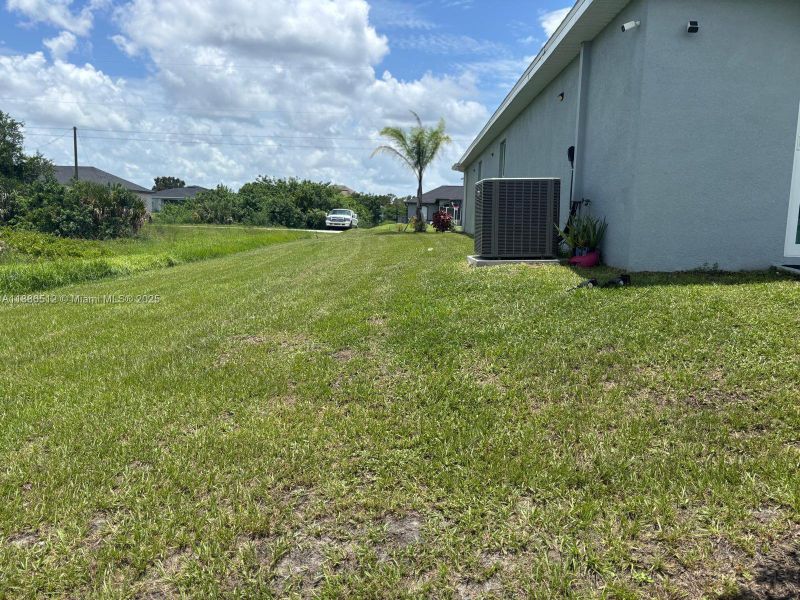Exterior details and patio area of a home in , Lehigh Acres (Image 2). Exterior details and patio area of a home in , Lehigh Acres (Image 2).