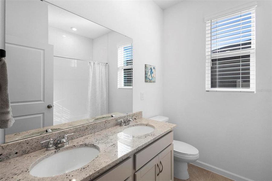 Guest bath with dual sinks