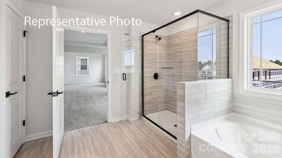 Furnished interior view inside a new home in Sanctuary at Southgate, Indian Trail (Image 9).