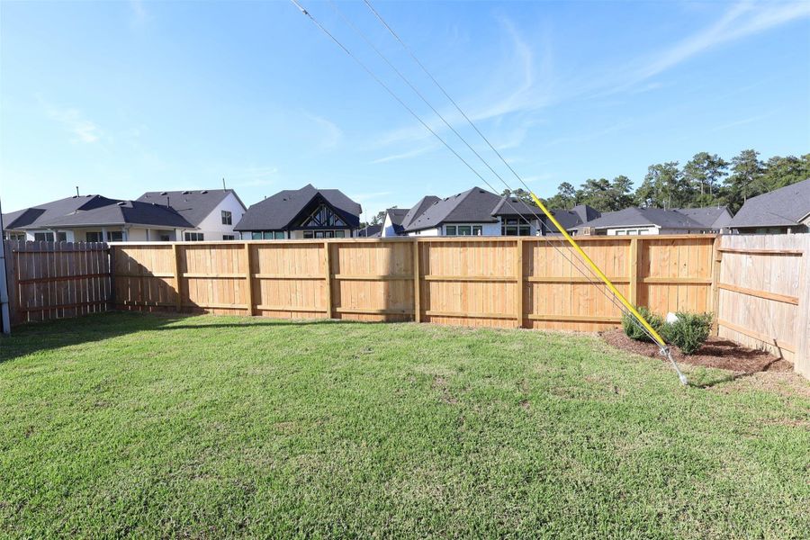 Exterior details and patio area of a home in Magnolia Ridge, Magnolia (Image 16). Exterior details and patio area of a home in Magnolia Ridge, Magnolia (Image 16).