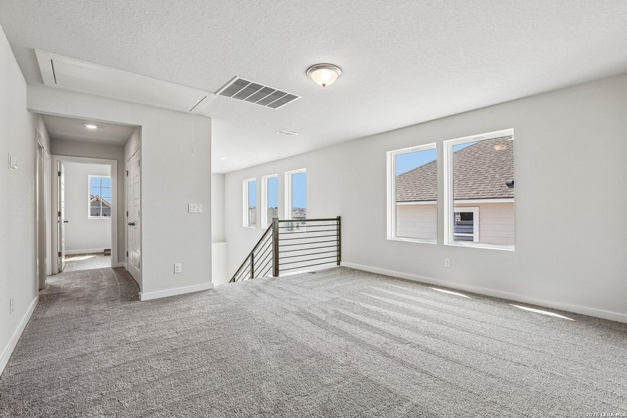 Spacious, unfurnished interior of a new home in Weston Oaks, San Antonio (Image 25).
