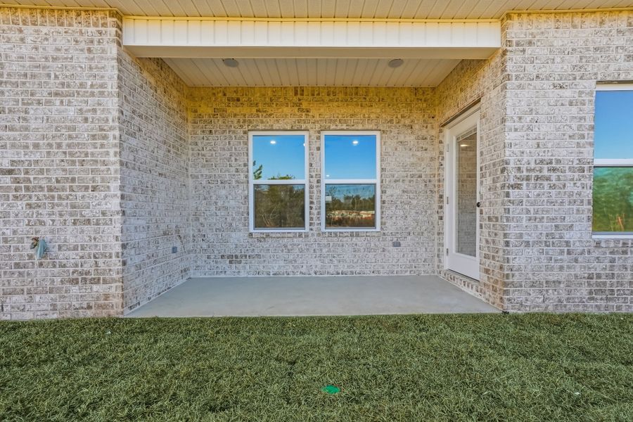 Exterior details and patio area of a home in Southern Day Chateau, Baker (Image 3).