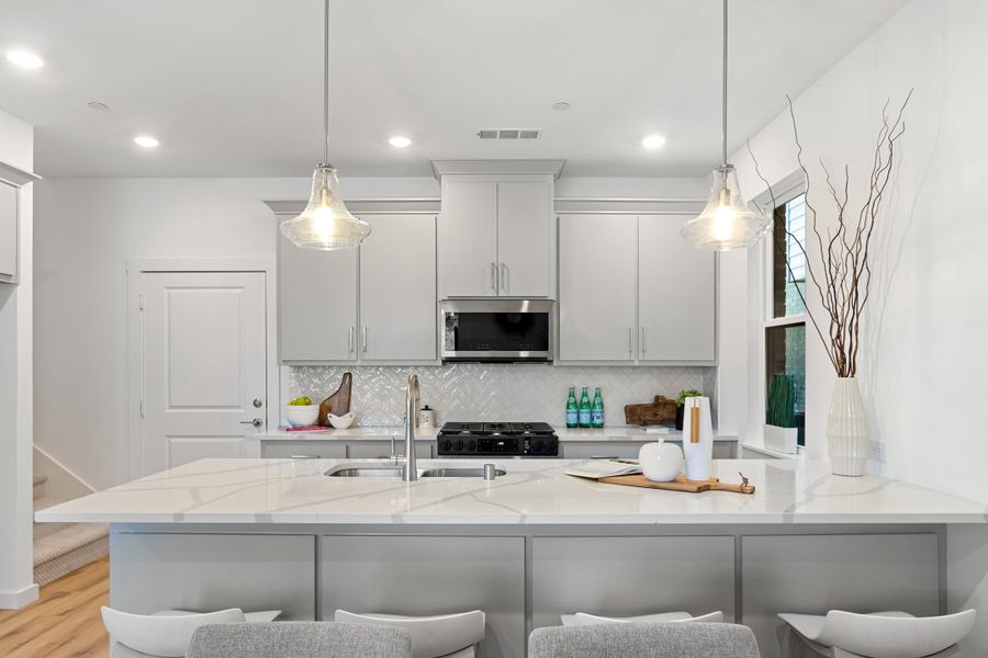 Furnished interior view inside a new home in Willow Grove Townhomes, Melissa (Image 10).