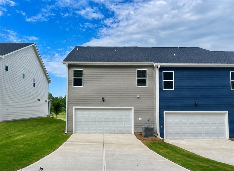 Front exterior of a new home in Brookland Commons, Monroe, GA, highlighting curb appeal (Image 20).