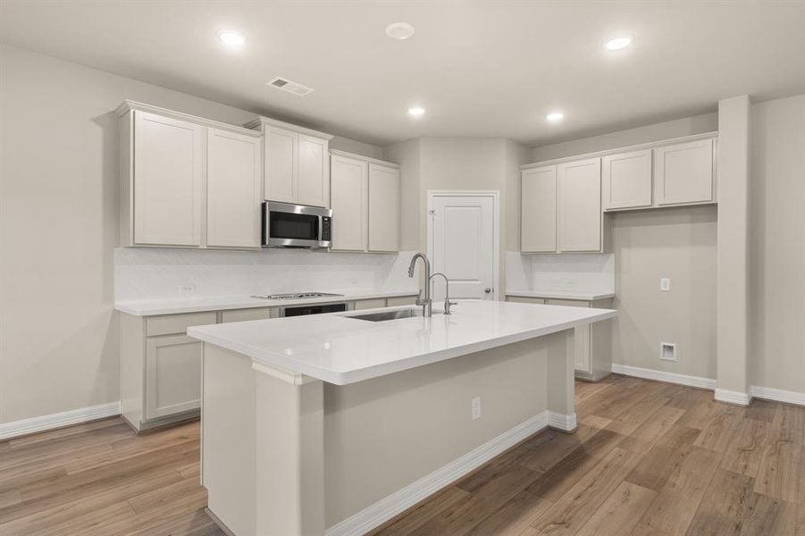 This kitchen is not only a functional space but also has ample storage. Whether you're a seasoned chef or just love to gather and enjoy good food, this kitchen is a dream come true.