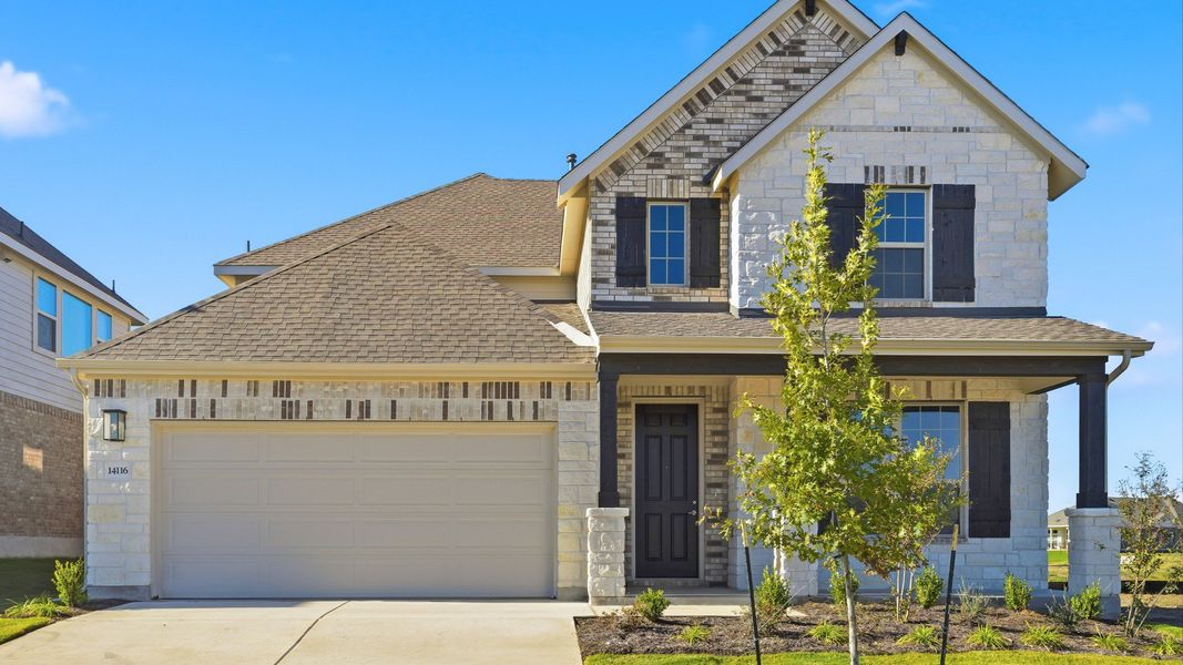 Representative exterior photo of a completed home built from the Elm by DRB Homes in Infinity Square, Kyle, TX (Image 24). Representative exterior photo of a completed home built from the Elm by DRB Homes in Infinity Square, Kyle, TX (Image 24).