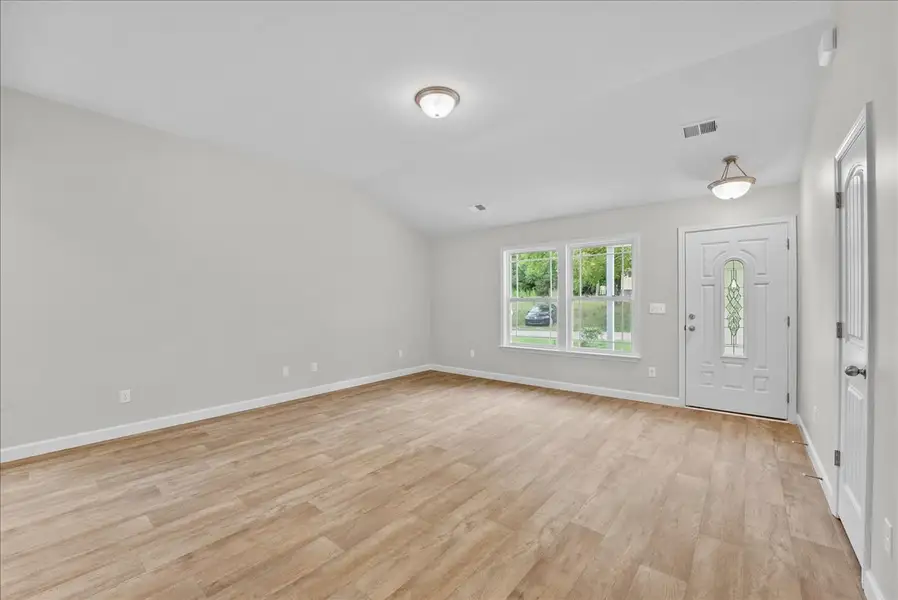 Representative unfurnished interior of a home built from the Lyman by Enchanted Homes in Lonesome Dove, San Antonio (Image 18).