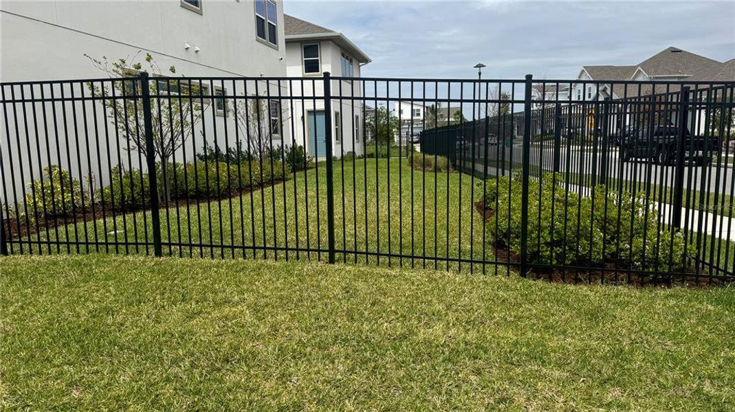 Exterior details and patio area of a home in Laureate Park, Orlando (Image 25).