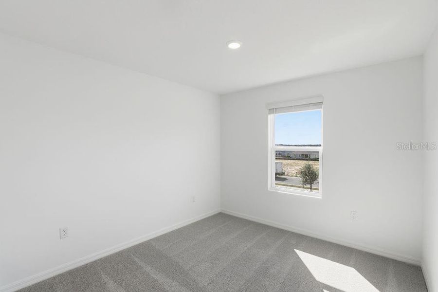 Spacious, unfurnished interior of a new home in Waterstone, Groveland (Image 32).