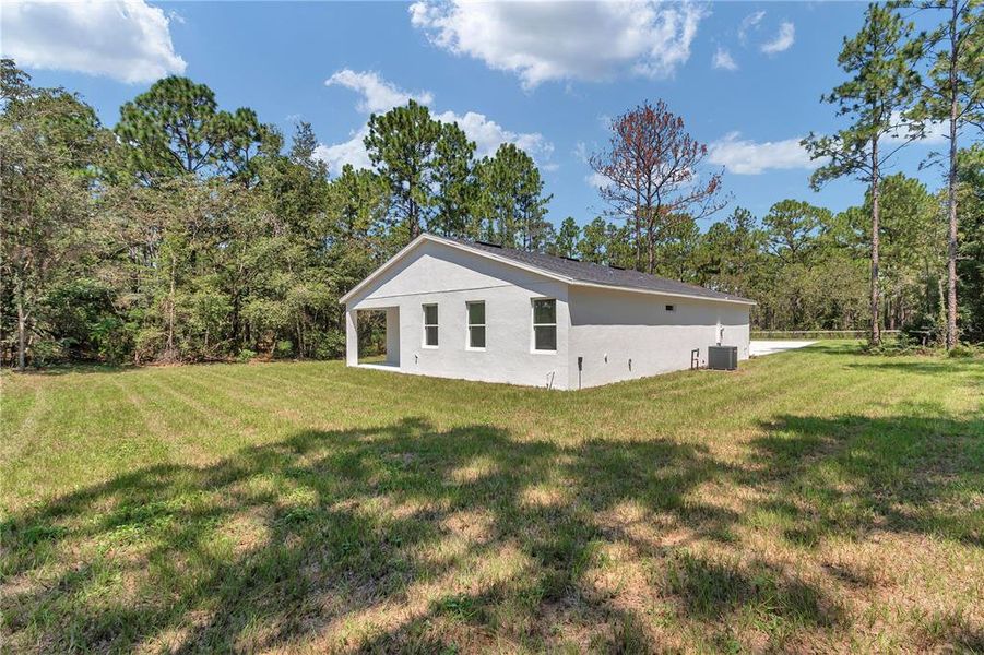 Front exterior of a new home in , Ocala, FL, highlighting curb appeal (Image 26).