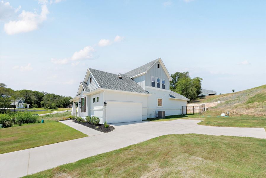 Extended driveway and 2 car garage, perfect for when entertaining