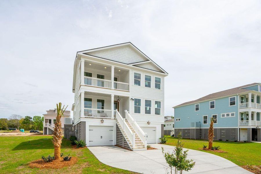 Front exterior of a new home in Kings River Preserve, Hollywood, SC, highlighting curb appeal (Image 1). Front exterior of a new home in Kings River Preserve, Hollywood, SC, highlighting curb appeal (Image 1).
