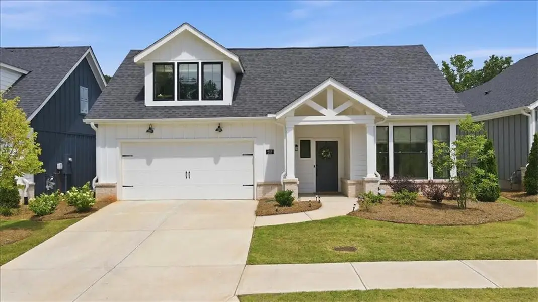 Front exterior of a new home in , Canton, GA, highlighting curb appeal (Image 2). Front exterior of a new home in , Canton, GA, highlighting curb appeal (Image 2).