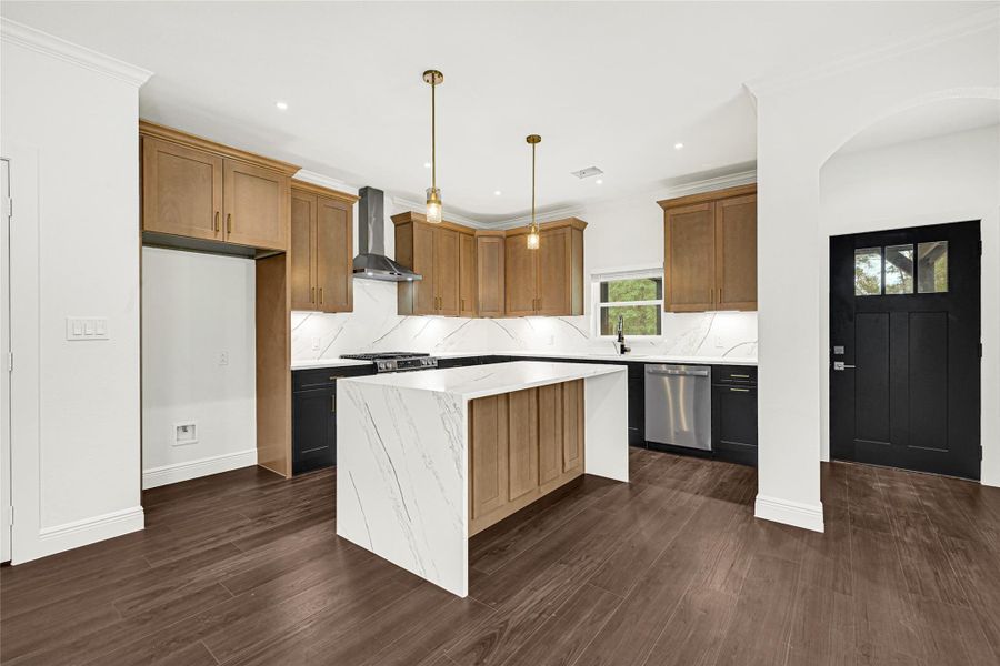 This modern kitchen features sleek wooden cabinets, a large marble island, and stainless steel appliances. It boasts elegant pendant lighting and dark hardwood floors, creating a warm and inviting space. This modern kitchen features sleek wooden cabinets, a large marble island, and stainless steel appliances. It boasts elegant pendant lighting and dark hardwood floors, creating a warm and inviting space.