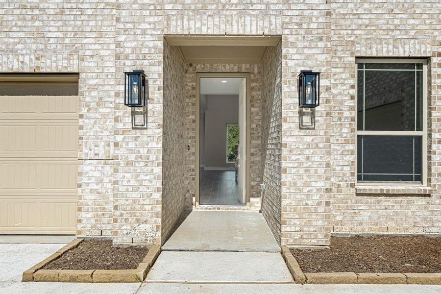 Front exterior of a new home in Sunset Ridge, Alvarado, TX, highlighting curb appeal (Image 2).