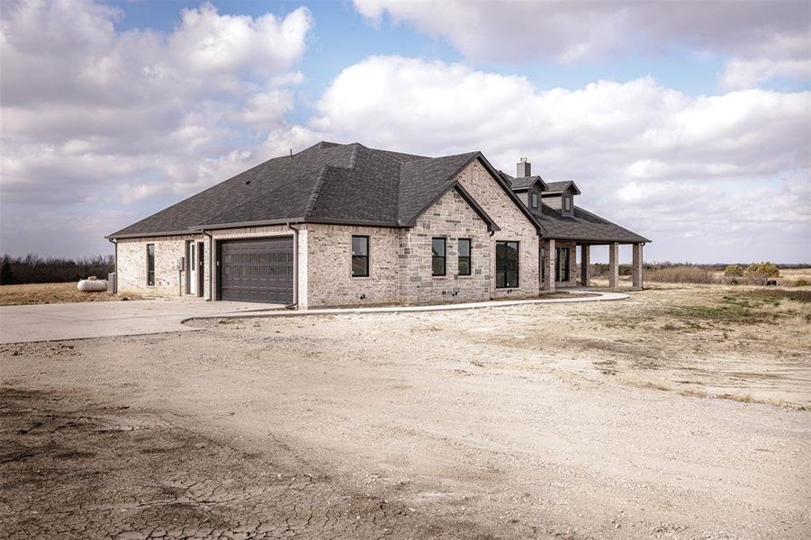 Front exterior of a new home in , Celeste, TX, highlighting curb appeal (Image 18). Front exterior of a new home in , Celeste, TX, highlighting curb appeal (Image 18).