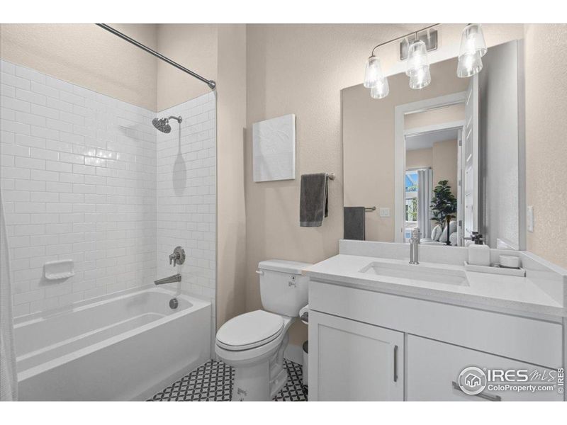 Furnished interior view inside a new home in Pelican Shores at Water Valley, Windsor (Image 17).