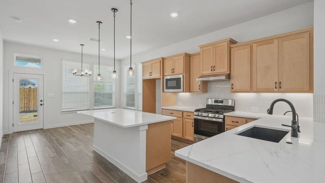 Representative furnished interior of a home built from the Portofino by Chesmar Homes in Legacy at Lake Dunlap, New Braunfels (Image 3).