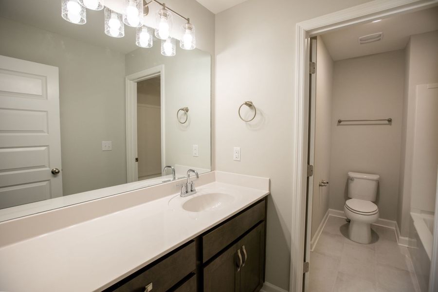 Representative furnished interior of a home built from the Dalton by Parkside Builders in The Woods, Gallatin (Image 8).