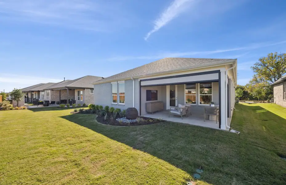 Exterior details and patio area of a home in Del Webb at Trinity Falls, McKinney (Image 2).