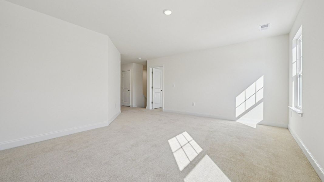 Representative furnished interior of a home built from the Wagener by DRB Homes in Station Pointe, Angier (Image 20).