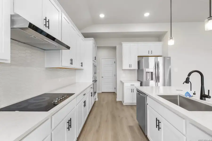 Furnished interior view inside a new home in Comanche Ridge, San Antonio (Image 7).
