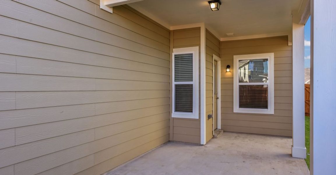 Representative exterior photo of a completed home built from the Adina by Impression Homes in Heartland, Heartland, TX (Image 25). Representative exterior photo of a completed home built from the Adina by Impression Homes in Heartland, Heartland, TX (Image 25).