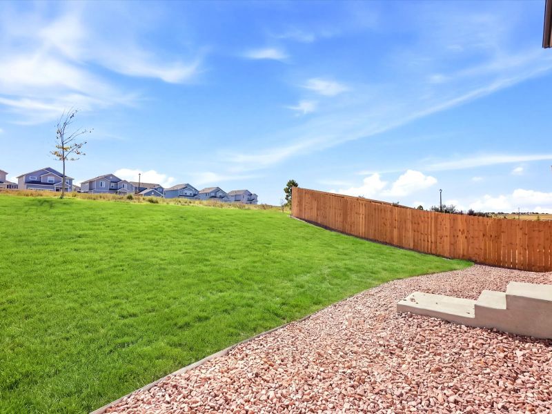 Exterior details and patio area of a home in Lorson Ranch : The Springs Collection, Colorado Springs (Image 3). Exterior details and patio area of a home in Lorson Ranch : The Springs Collection, Colorado Springs (Image 3).