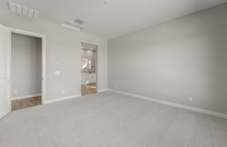 Spacious, unfurnished interior of a new home in Legado West, Queen Creek (Image 21).