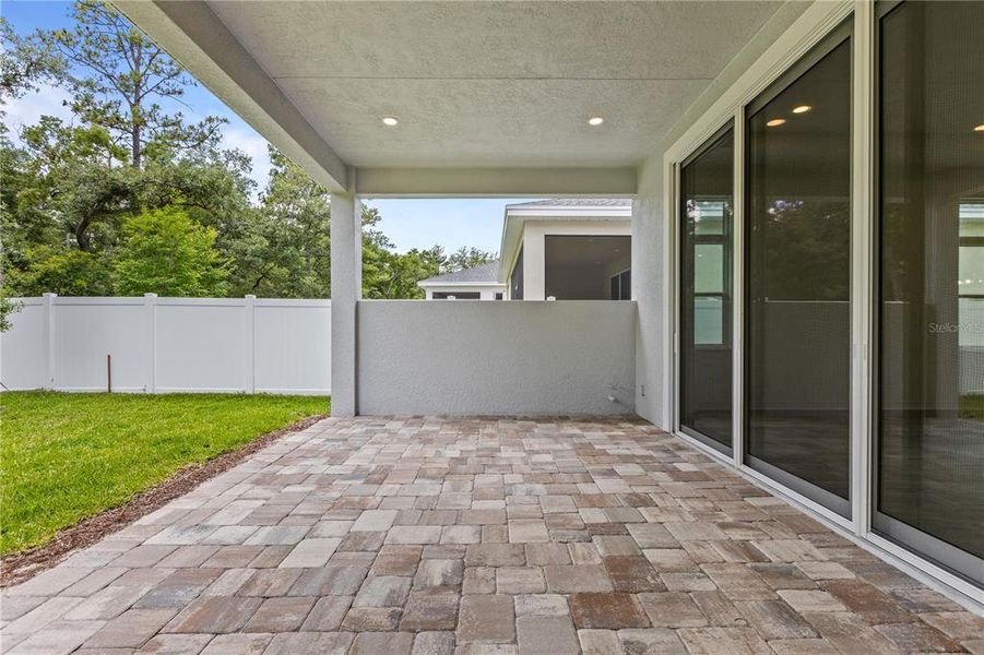 Exterior details and patio area of a home in The Reserve at Victoria, Deland (Image 24).