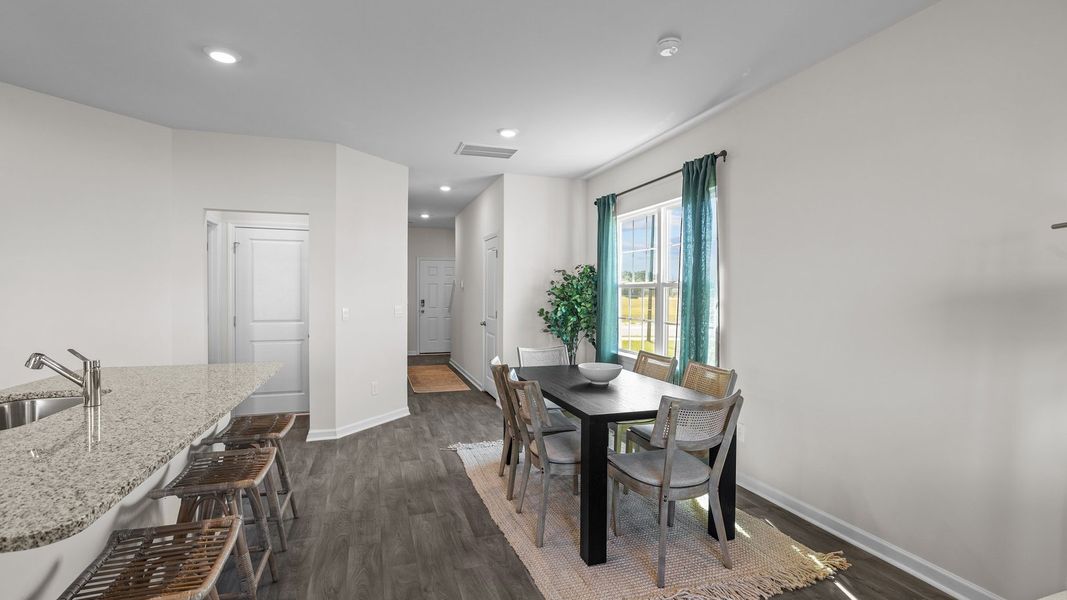 Furnished interior view inside a new home in The Townes at Ridgewood Farms, Winterville (Image 10).