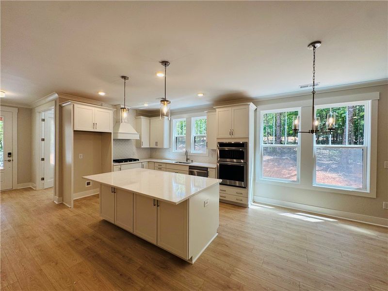 This spacious kitchen offers an ideal layout for e