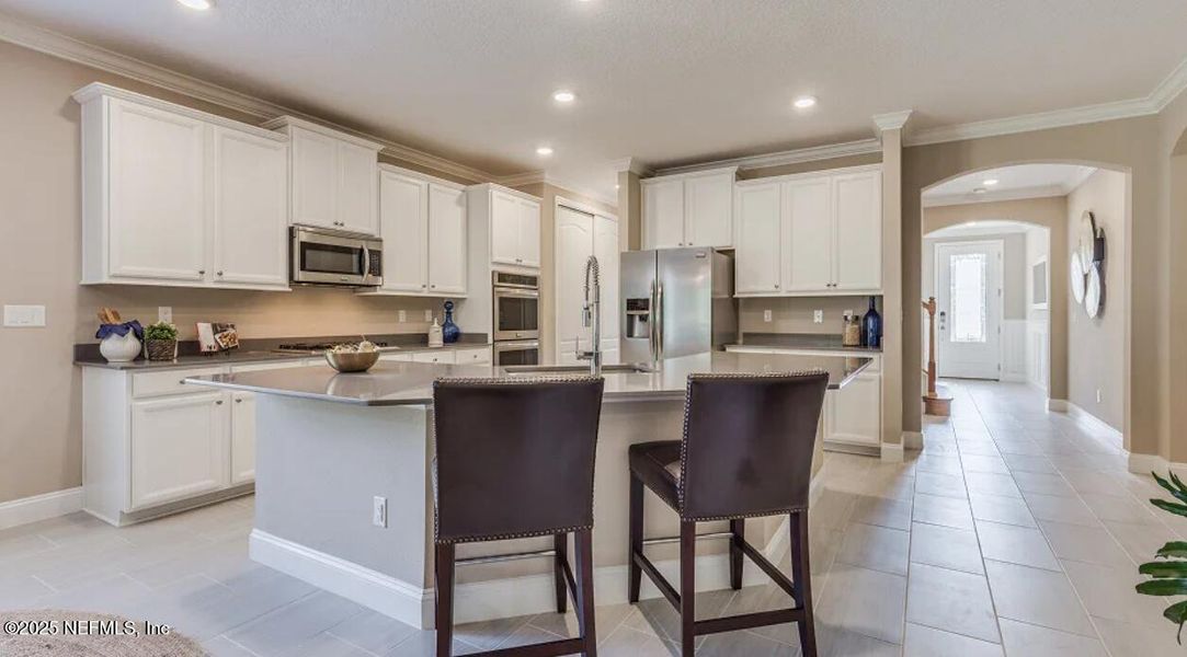 Furnished interior view inside a new home in Silver Falls Single Family at SilverLeaf: Silver Falls 60s at SilverLeaf, St. Augustine (Image 22).