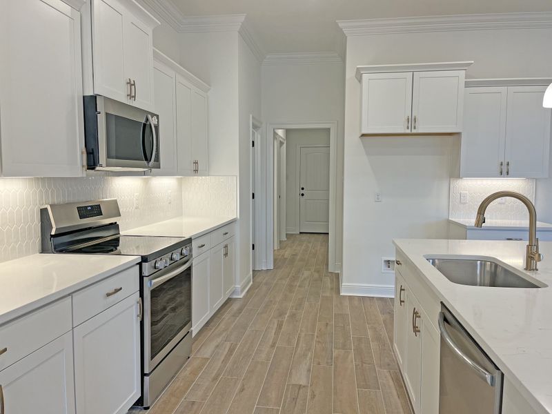 Furnished interior view inside a new home in Bird Song at Hammock Bay, Freeport (Image 8).