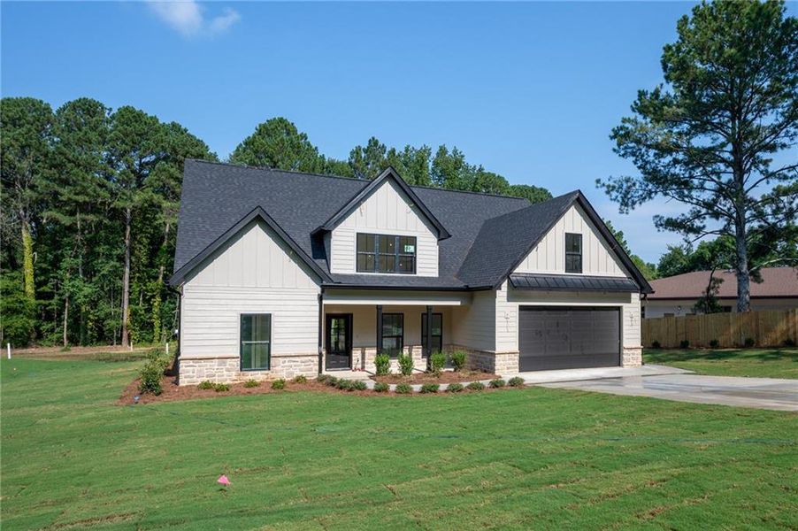 Front exterior of a new home in , Calhoun, GA, highlighting curb appeal (Image 1). Front exterior of a new home in , Calhoun, GA, highlighting curb appeal (Image 1).
