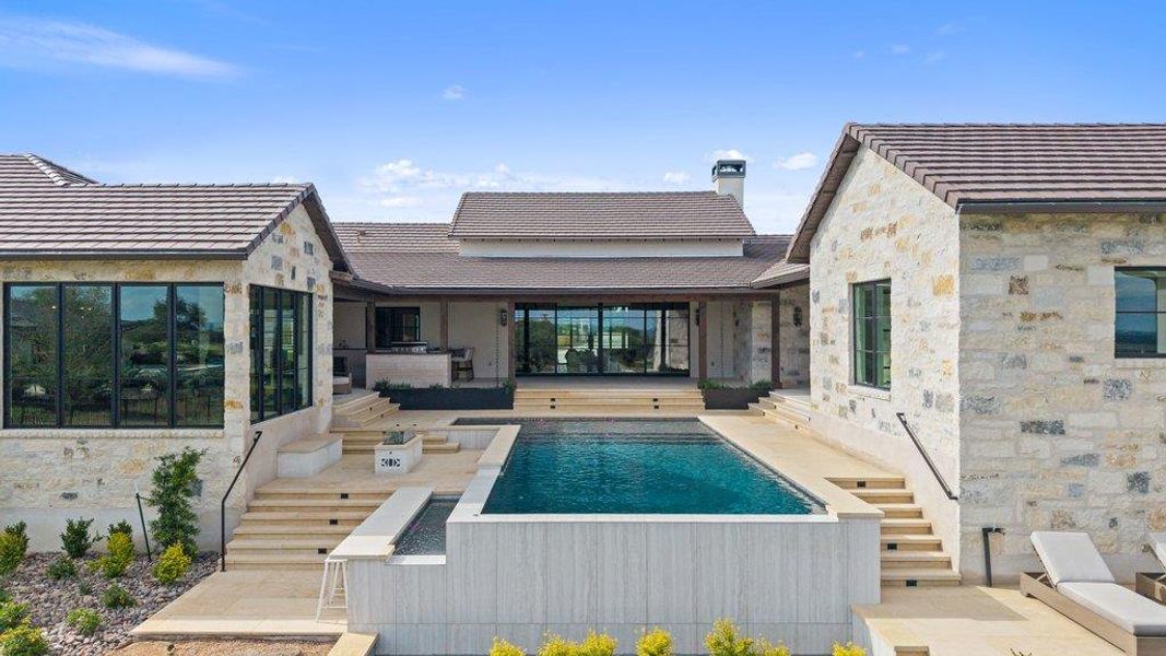 Exterior details and patio area of a home in , Spicewood (Image 3).