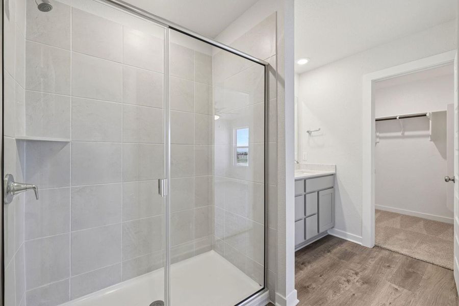 Furnished interior view inside a new home in The Hollows at Avery Centre, Round Rock (Image 12).