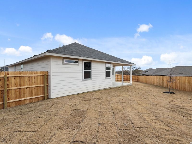 Exterior details and patio area of a home in Horizon Pointe, Converse (Image 24).