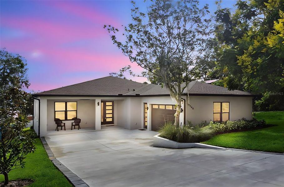 Front exterior of a new home in , Montverde, FL, highlighting curb appeal (Image 24). Front exterior of a new home in , Montverde, FL, highlighting curb appeal (Image 24).