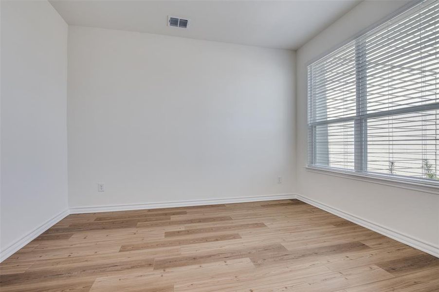 Spacious, unfurnished interior of a new home in Cottonwood Creek, Seagoville (Image 22).