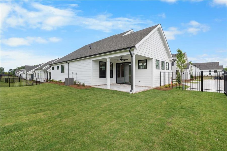 Exterior details and patio area of a home in Promenade at Sawnee Village, Cumming (Image 2).