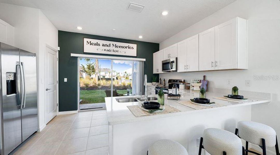 Furnished interior view inside a new home in Firethorn, Parrish (Image 6).