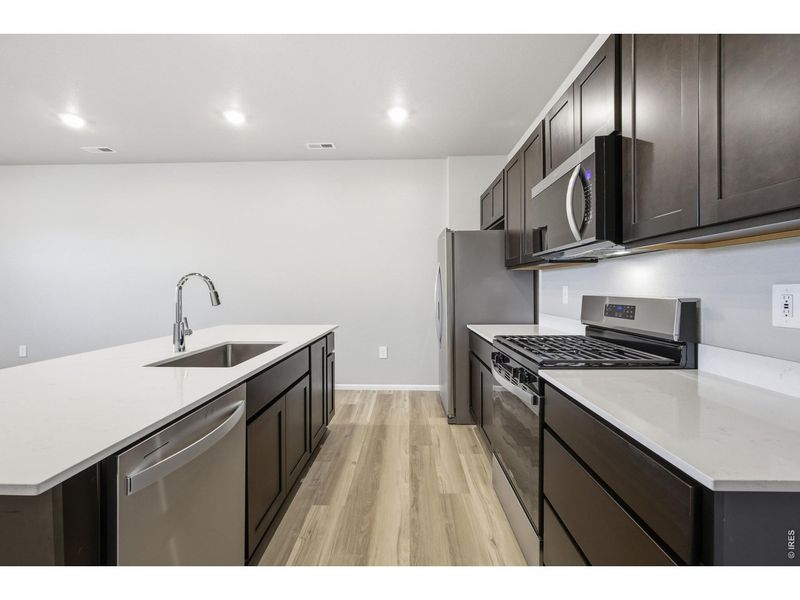 Furnished interior view inside a new home in Poudre Heights: The Meadow Collection, Windsor (Image 11).