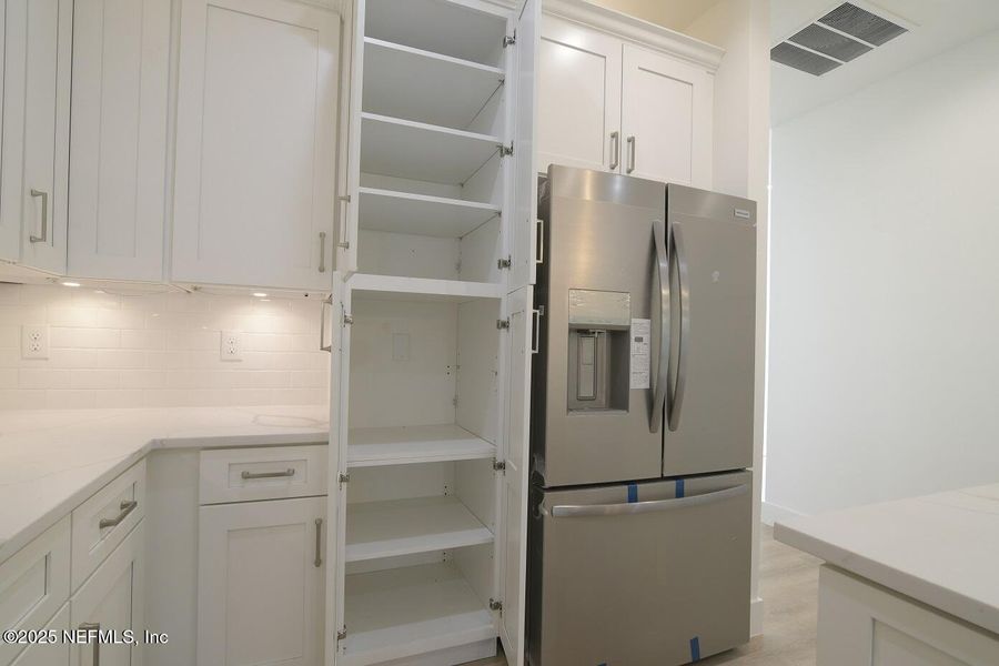 Furnished interior view inside a new home in , Jacksonville (Image 13).