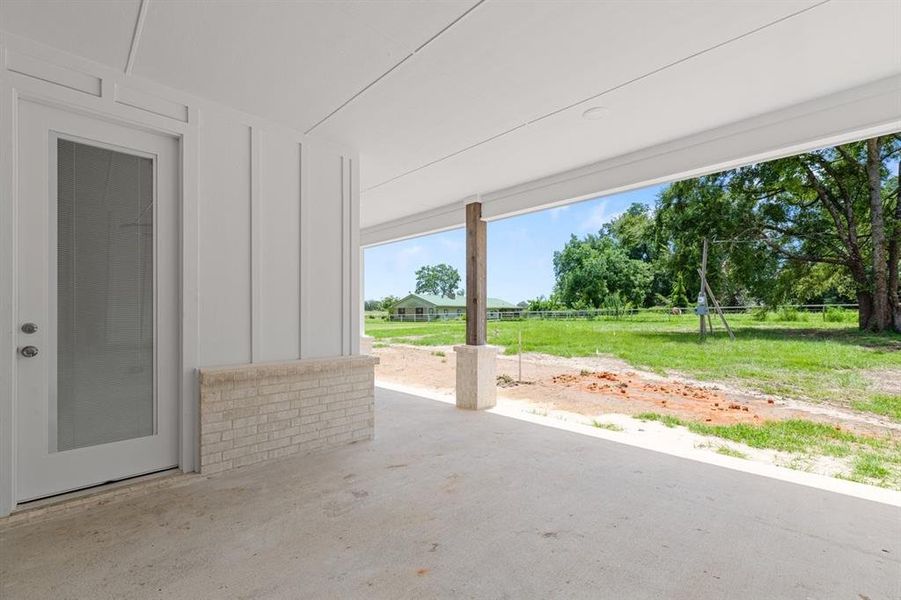 Extended back patio with added pad on the side Extended back patio with added pad on the side