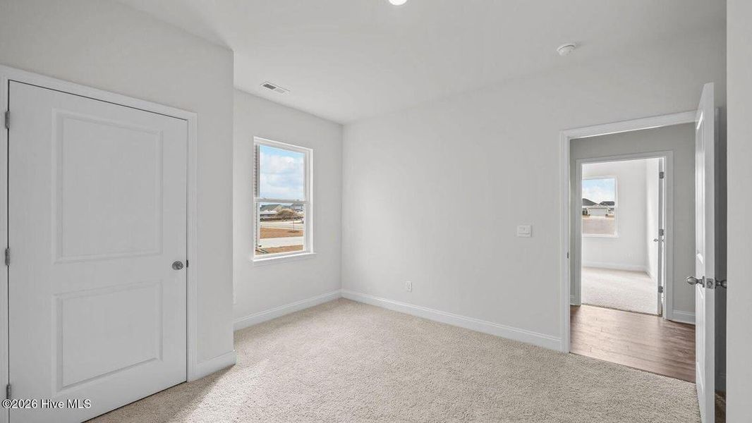 Spacious, unfurnished interior of a new home in Villa Grande, Winterville (Image 15).